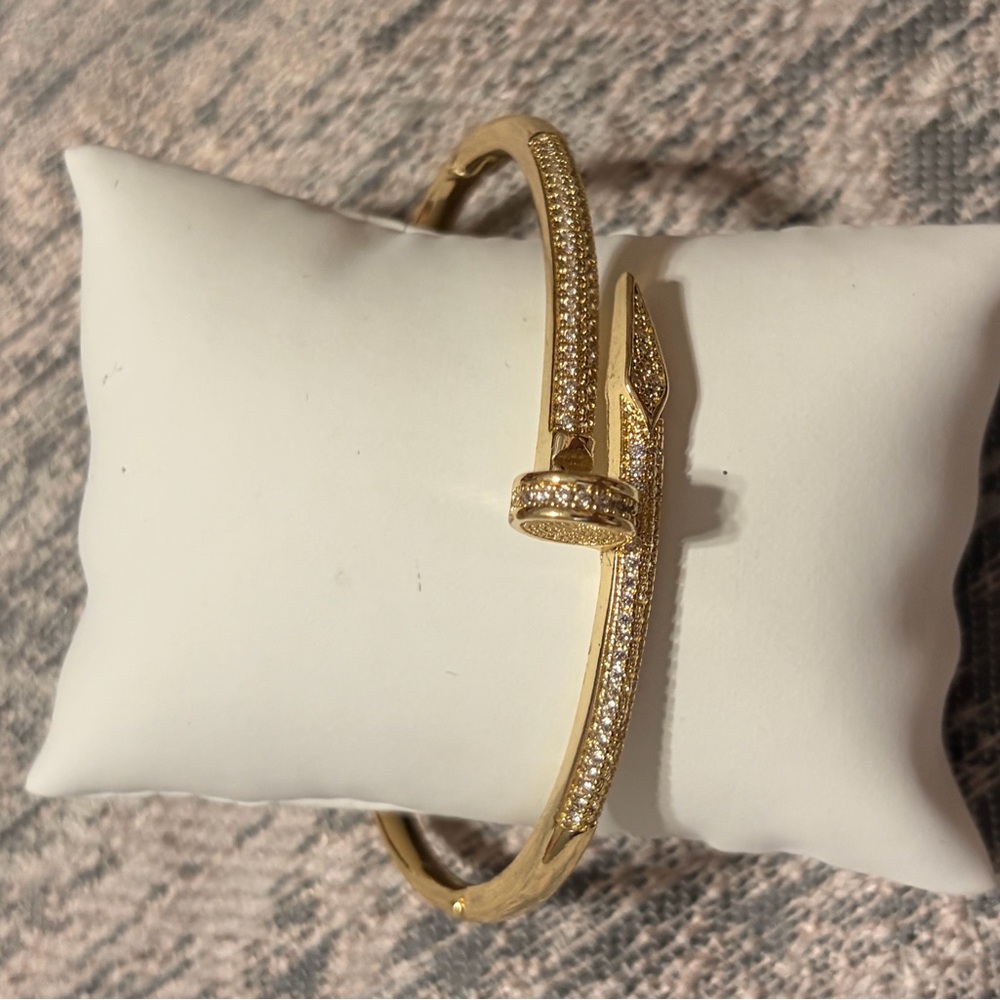 Elegant Gold Nail Bracelet